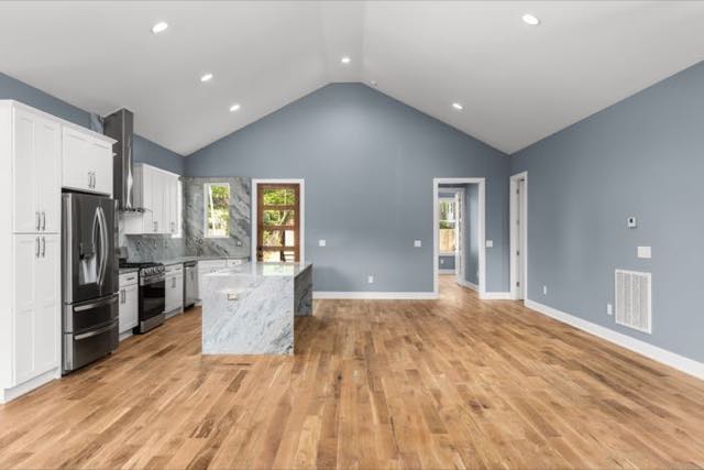 Vaulted open living space at 915 Emmett Avenue