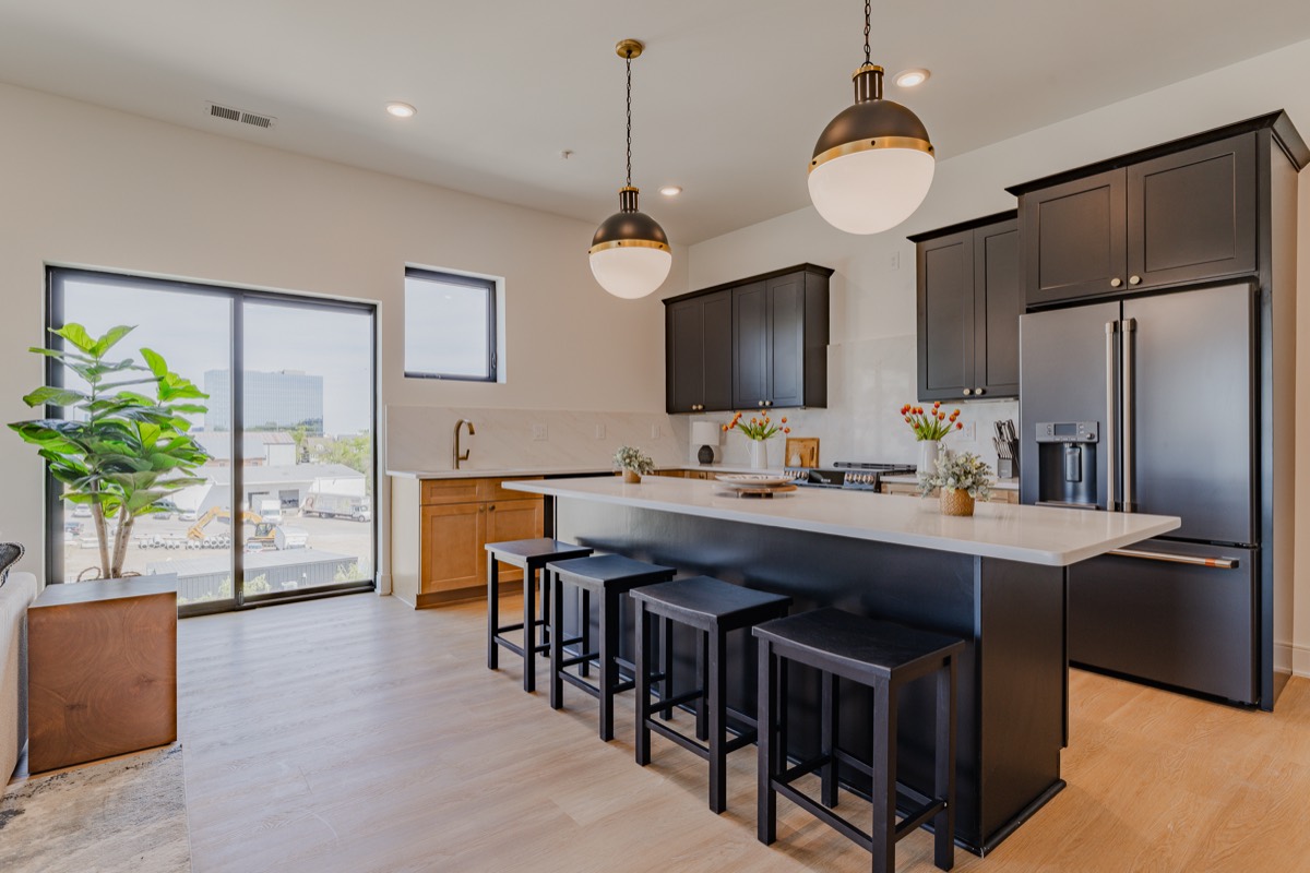 Black and natural wood kitchen inside Hayden Mansion